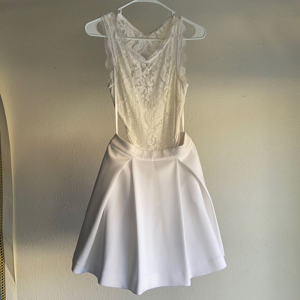 Beautiful BEBE backless dress.